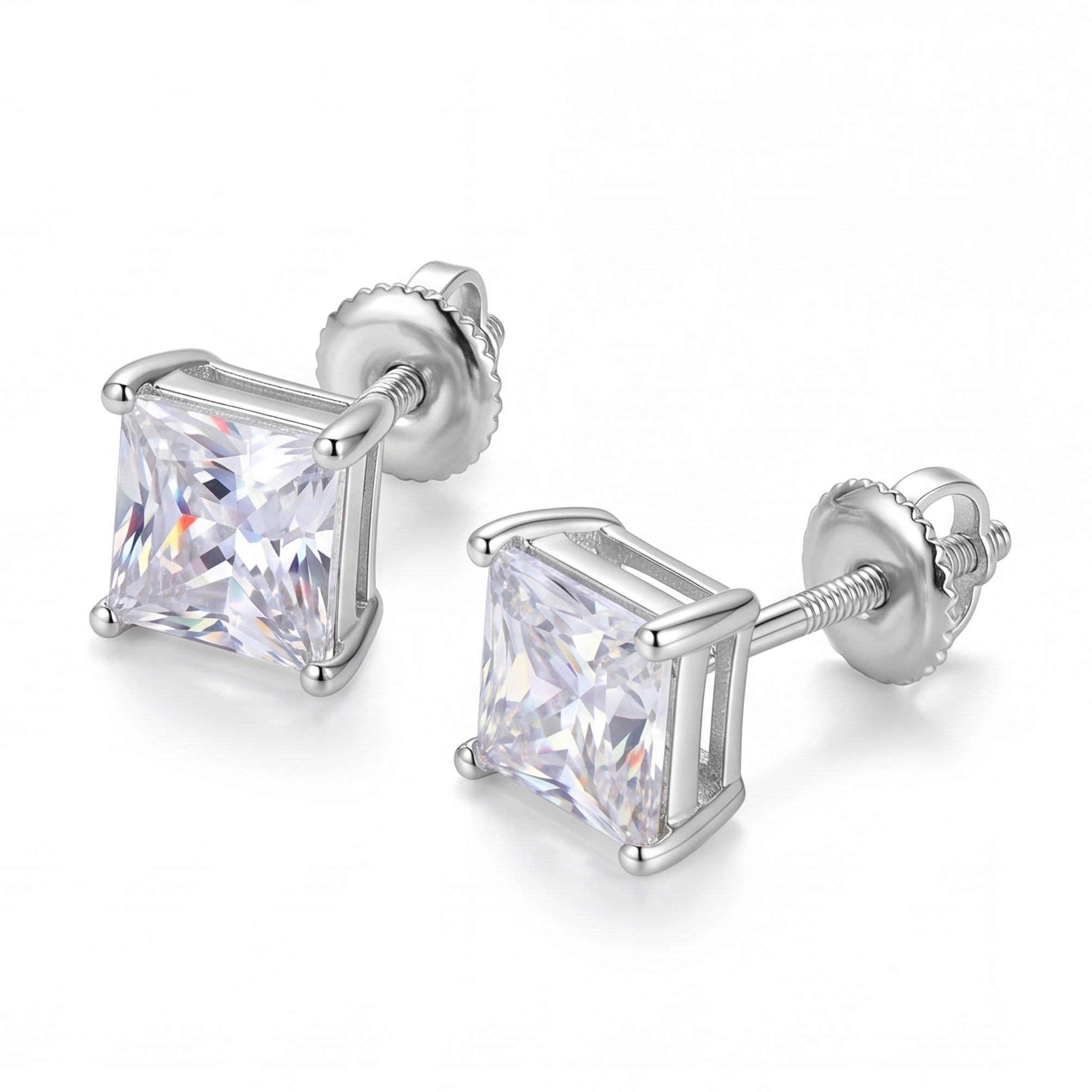 Pair of silver stud earrings with clear gemstones on a white background #color_silver