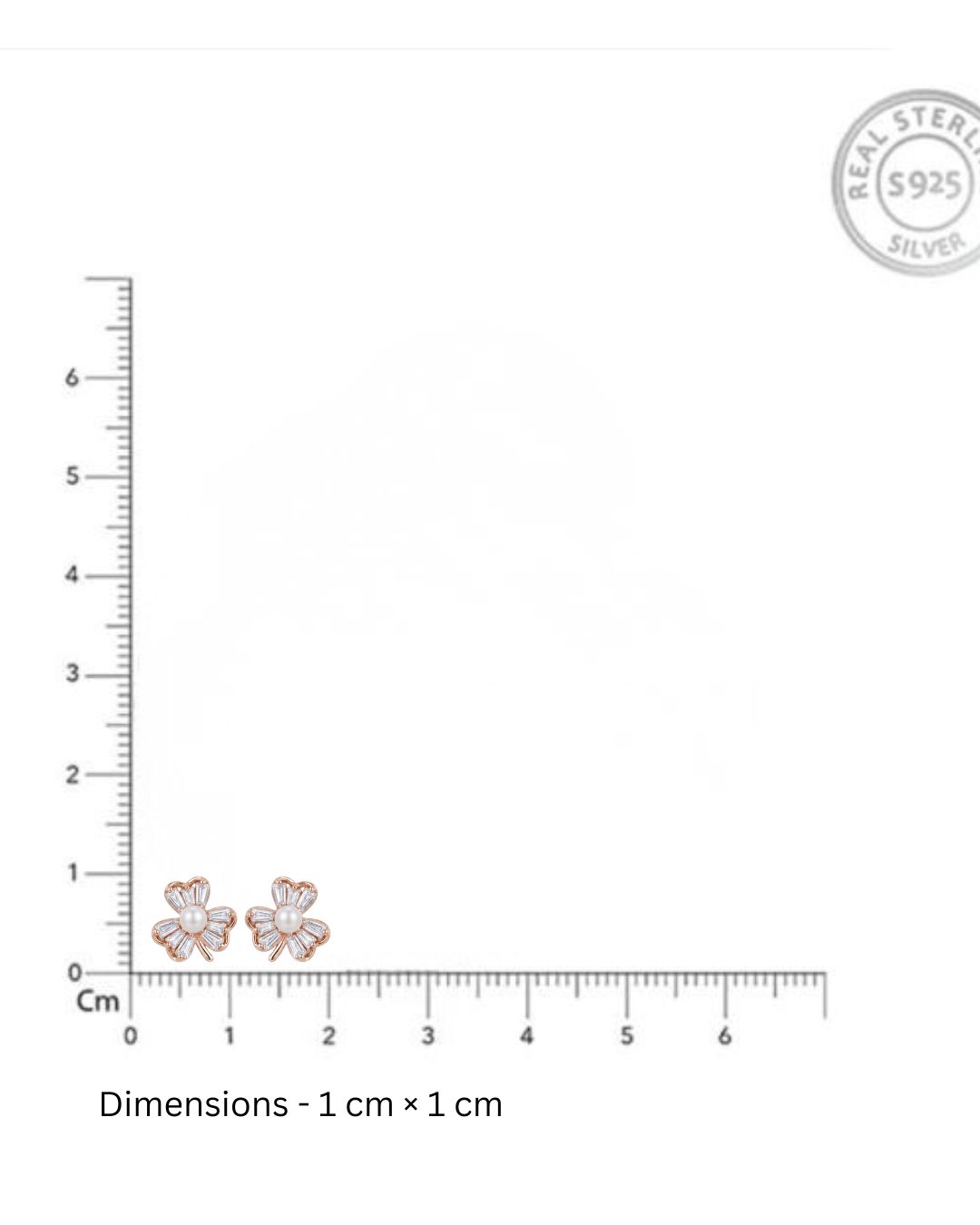 Pair of silver earrings with floral design on a white background with measurement scale and 'Real Sterling Silver 925' stamp.
