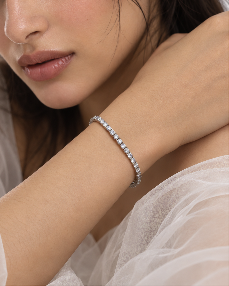 Classic tennis bracelet with round-cut white accents