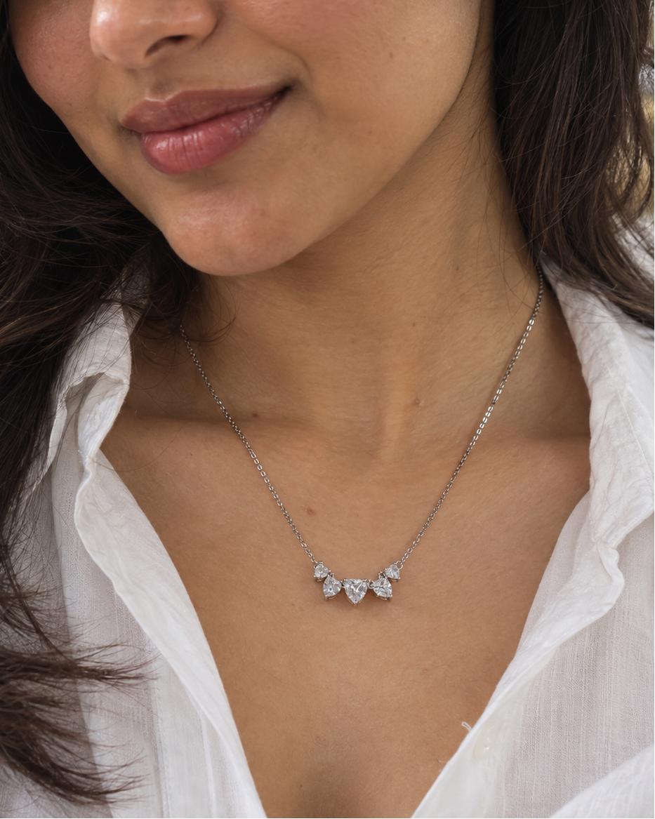 Heart cluster necklace with sparkling heart-shaped accents
