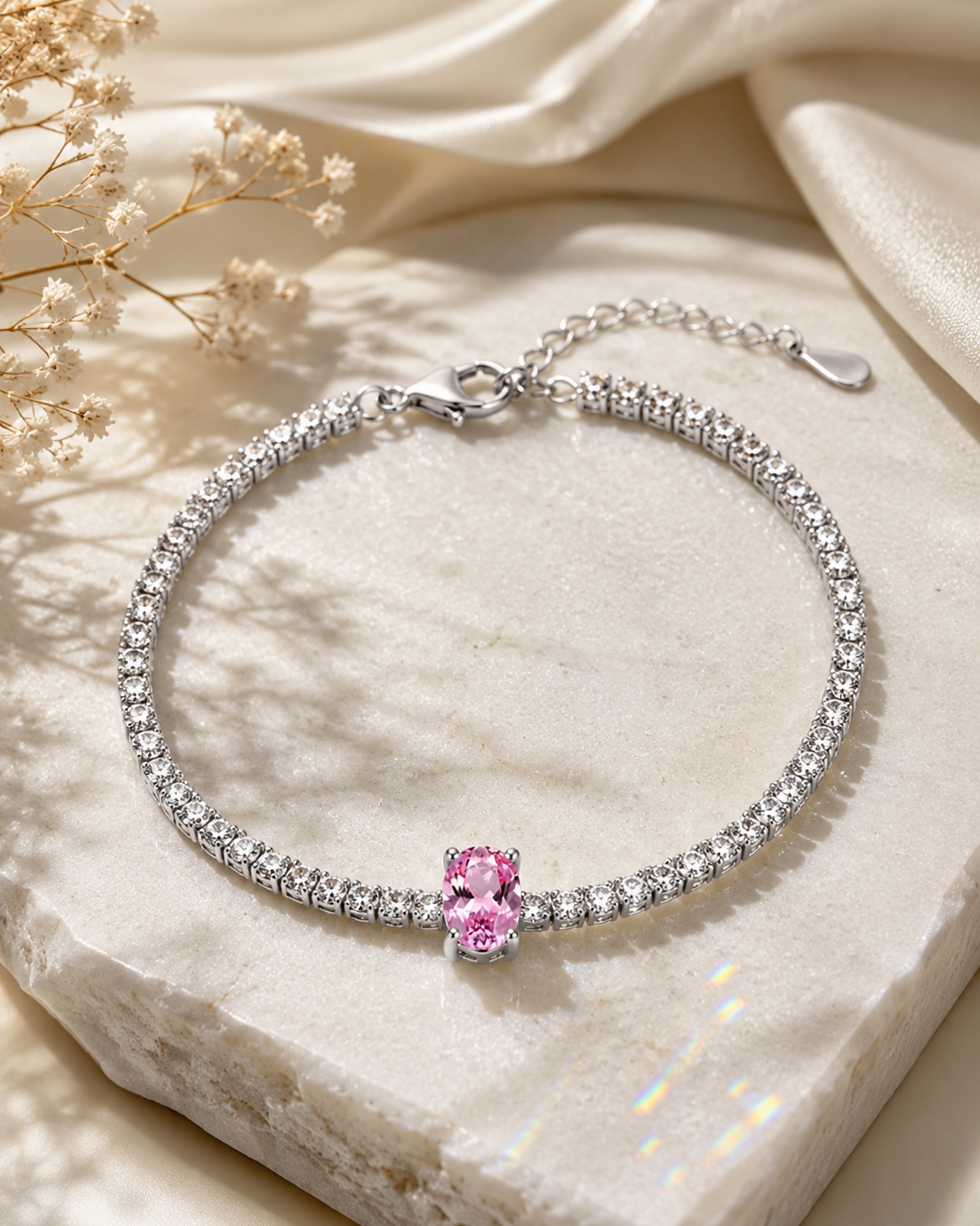 Pink solitaire tennis bracelet