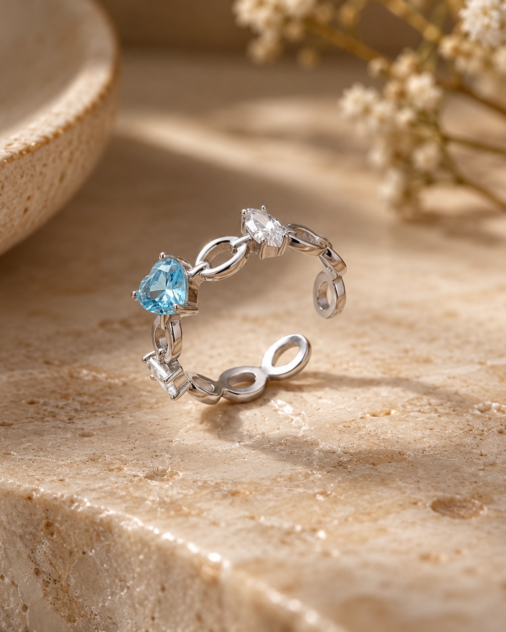 925 Sterling Silver heart link open ring with blue and white accents.