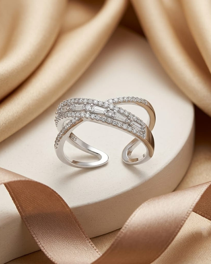 925 Sterling Silver crisscross ring with baguette and pavé white accents
