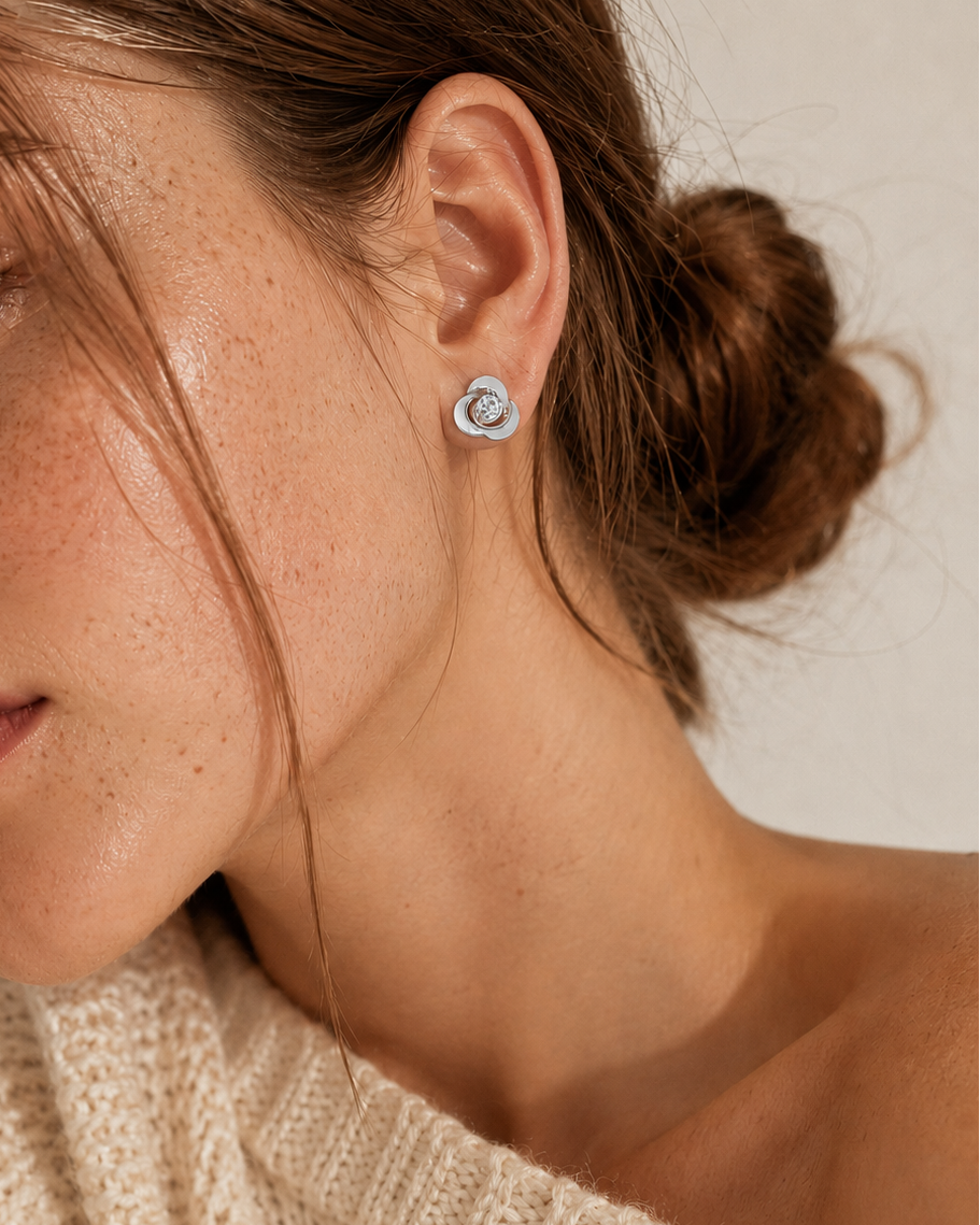 Celeste Swirl Stud Earrings #color_silver