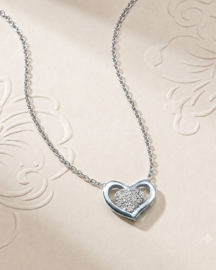 Silver heart-shaped necklace with a diamond on an embossed beige background #color_silver