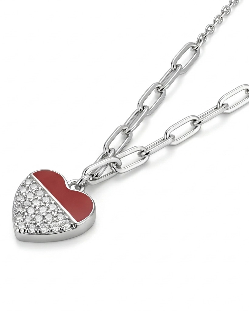 Heart-shaped pendant with red and clear gemstones on a silver chain against a white background #color_silver