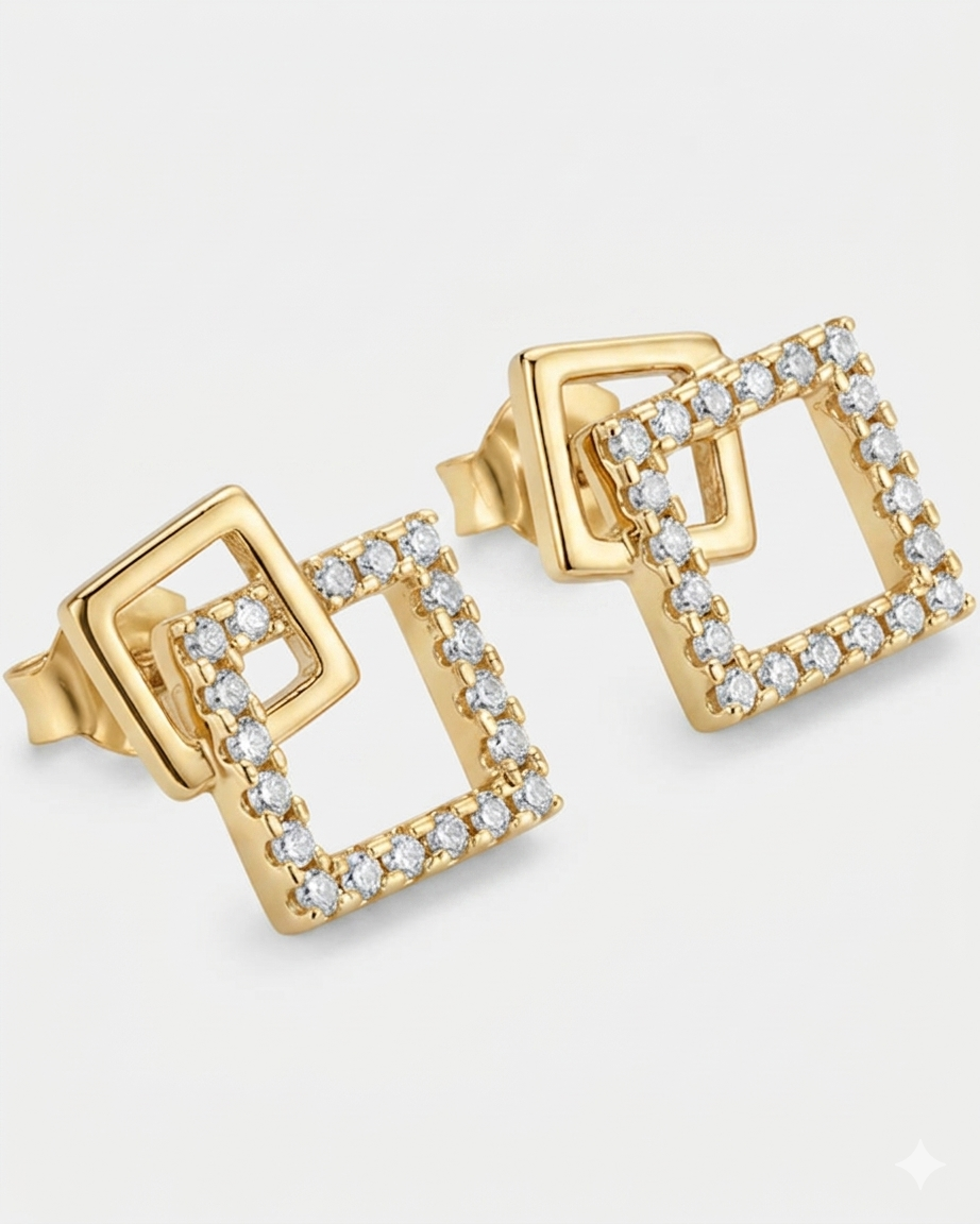 Gold square earrings with clear stones on a light gray background #color_gold
