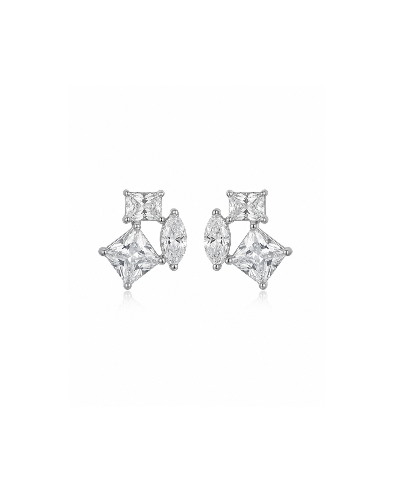 Pair of diamond earrings on a white background #color_silver