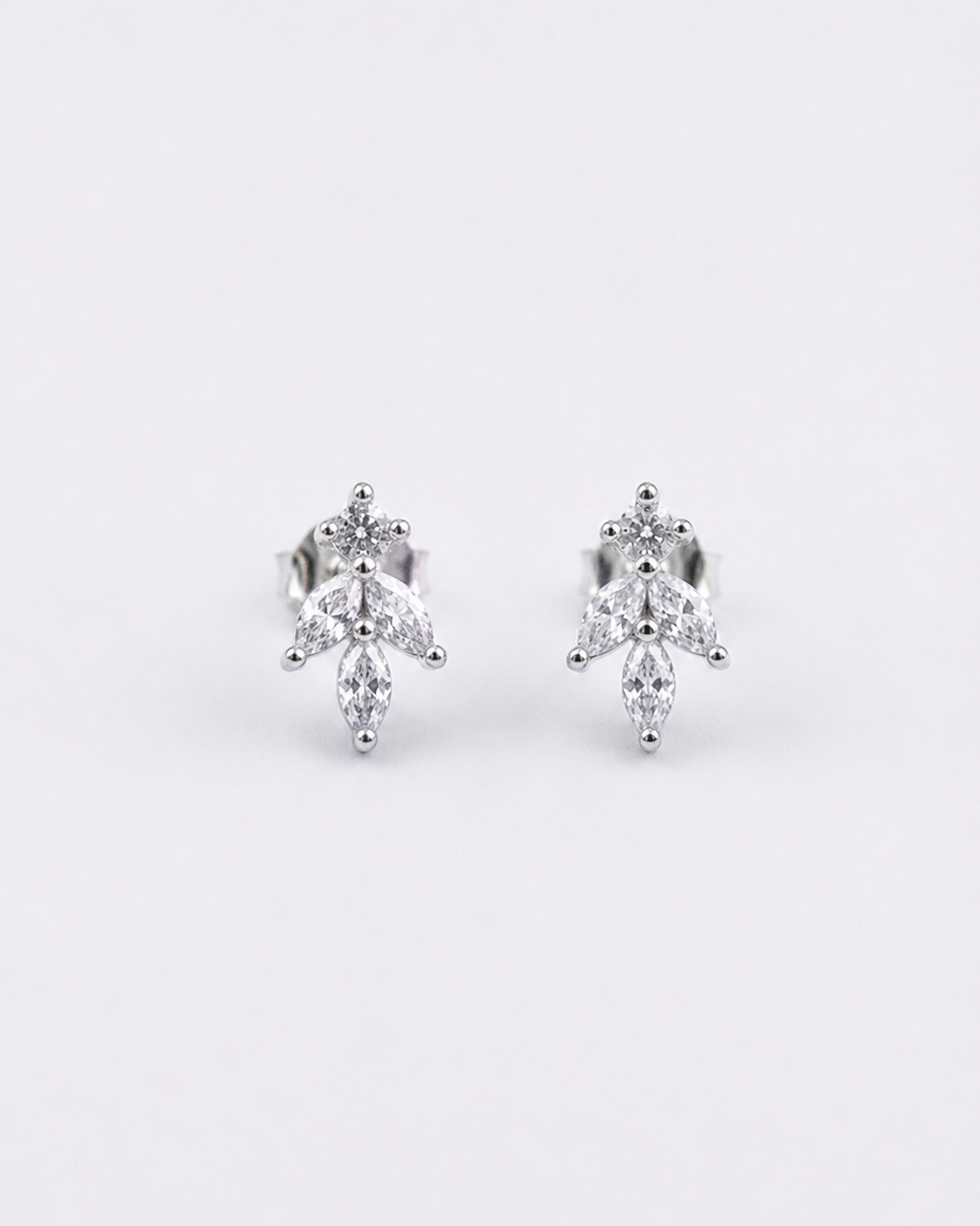 marquise-cut white stone cluster leaf stud earrings #color_silver