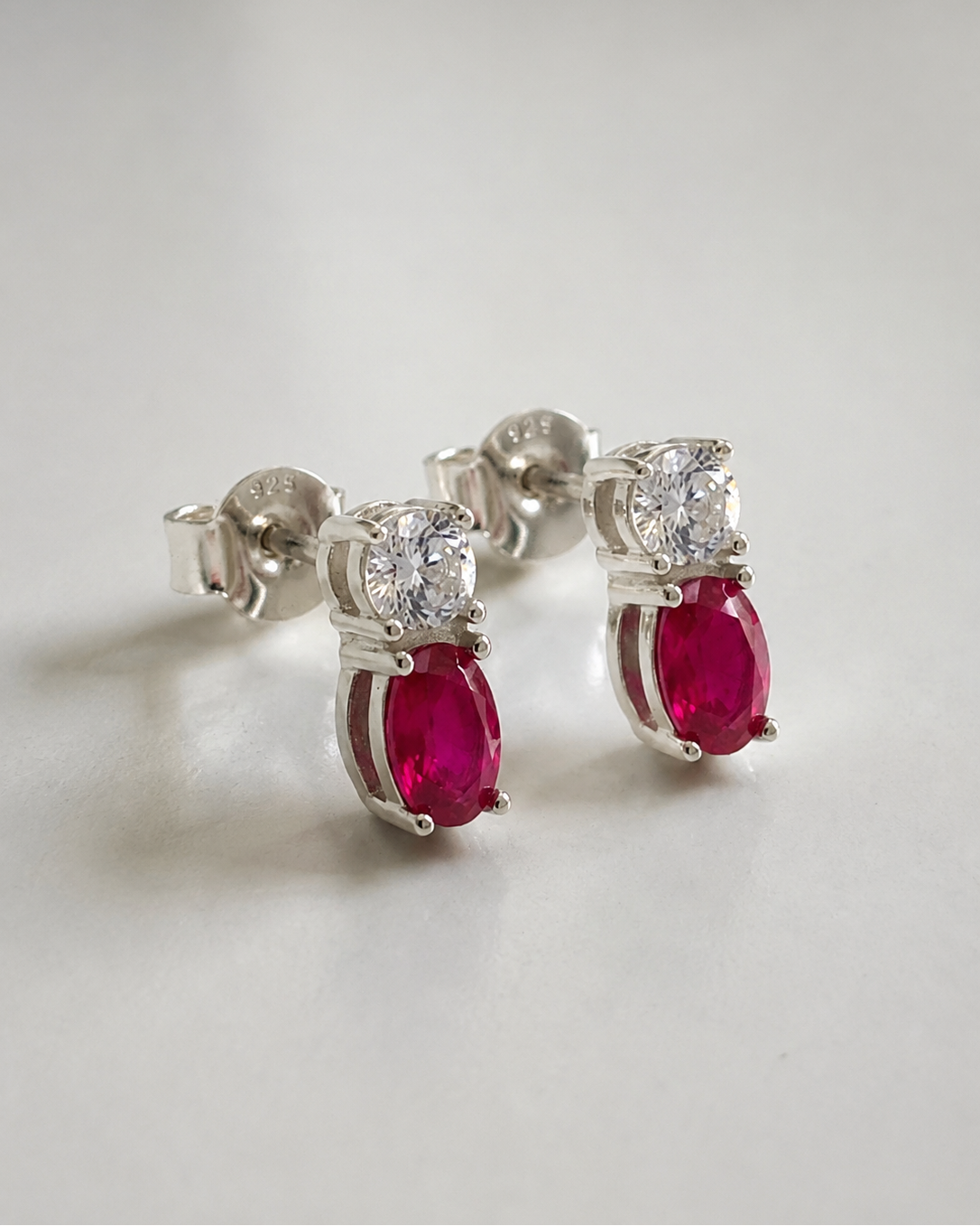 pink oval and round clear earrings #color_silver