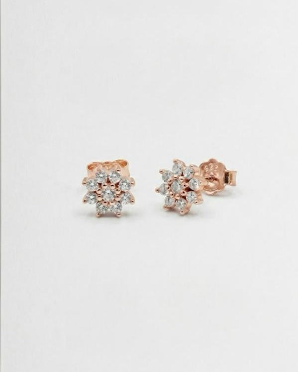 snowflake cluster stud earrings with brilliant white accents #color_rose gold
