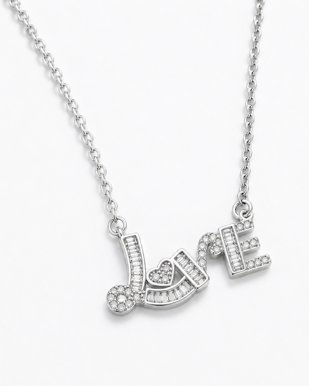 Silver necklace with 'LOVE' pendant on a white background #color_silver