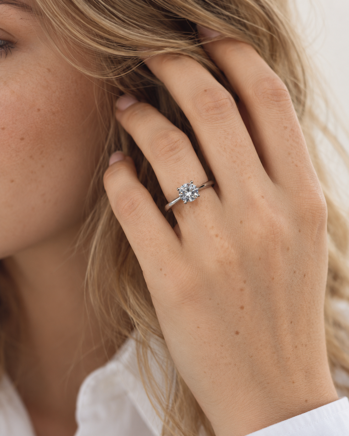 Round solitaire ring with polished silver band