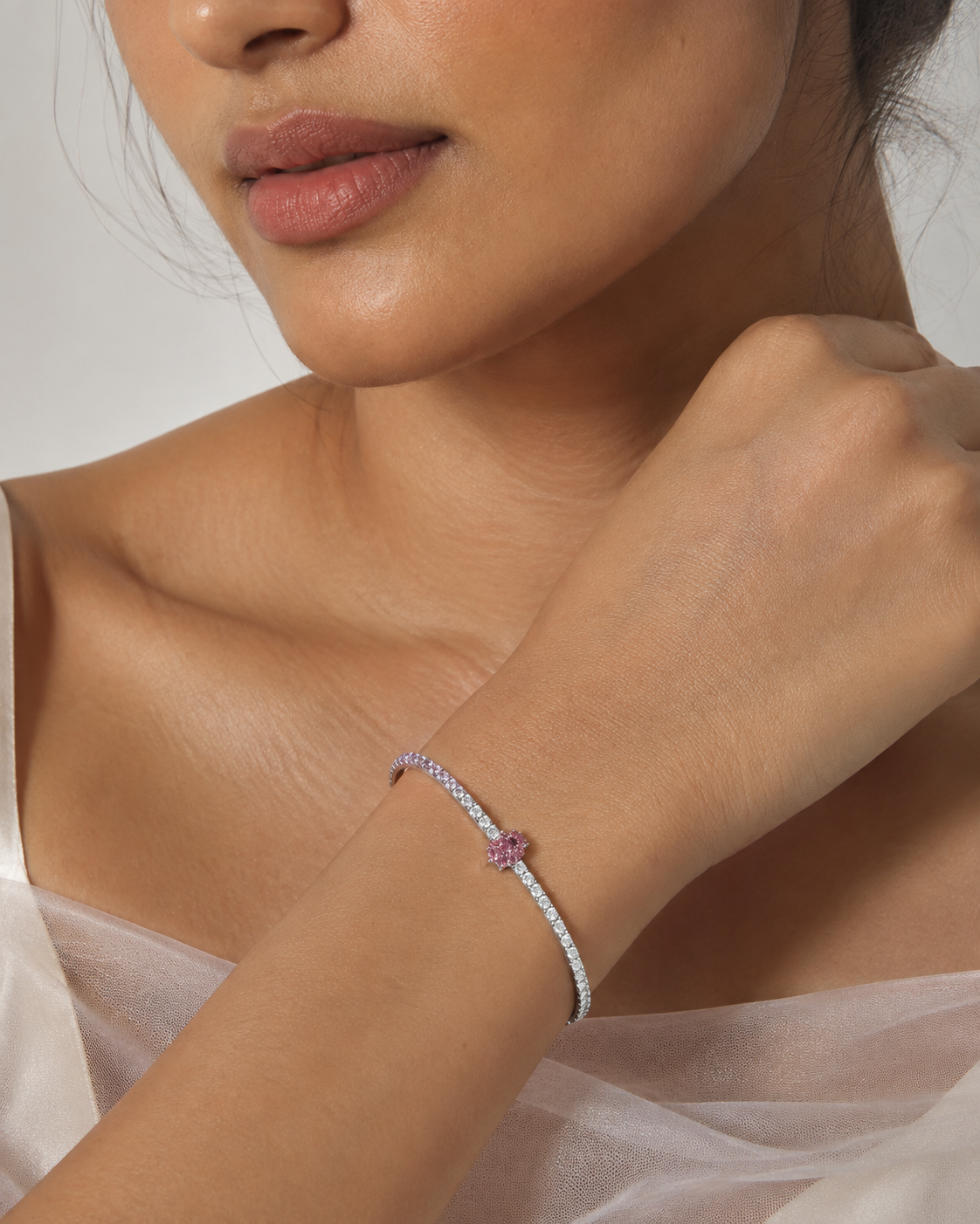 Pink solitaire tennis bracelet#color_silver