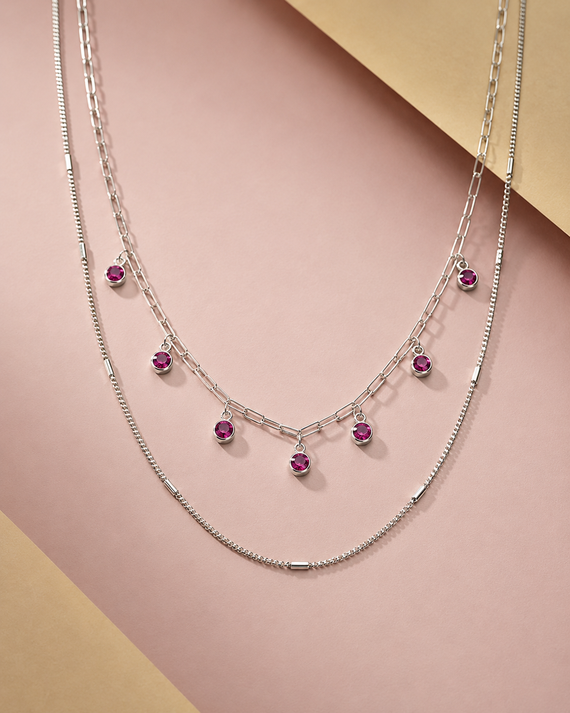 layered necklace with elongated link chain and pink accents #color_silver