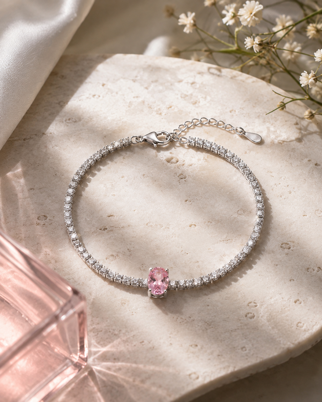 Pink solitaire tennis bracelet