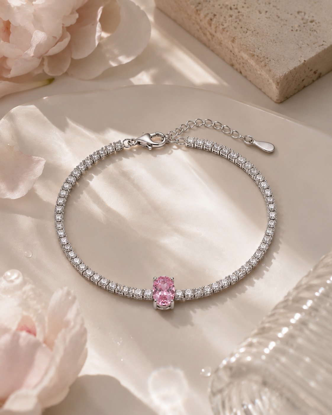 Pink solitaire tennis bracelet