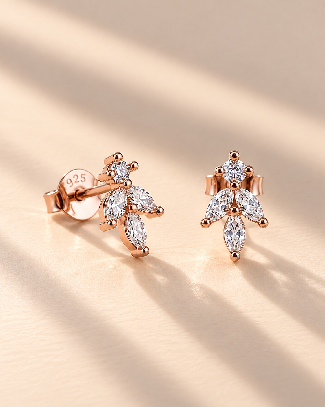 marquise-cut white stone cluster leaf stud earrings #color_rose gold