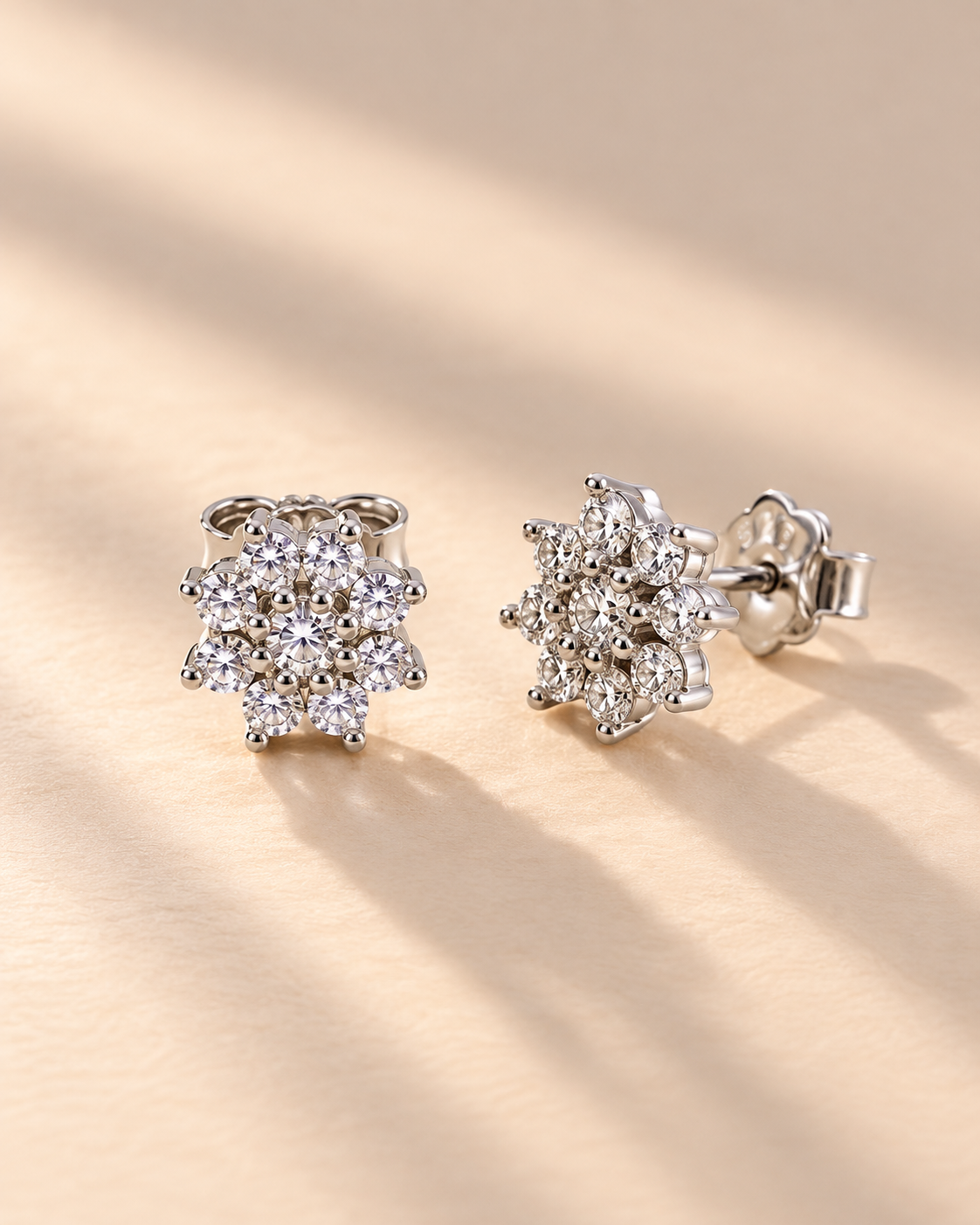 snowflake cluster stud earrings with brilliant white accents #color_silver