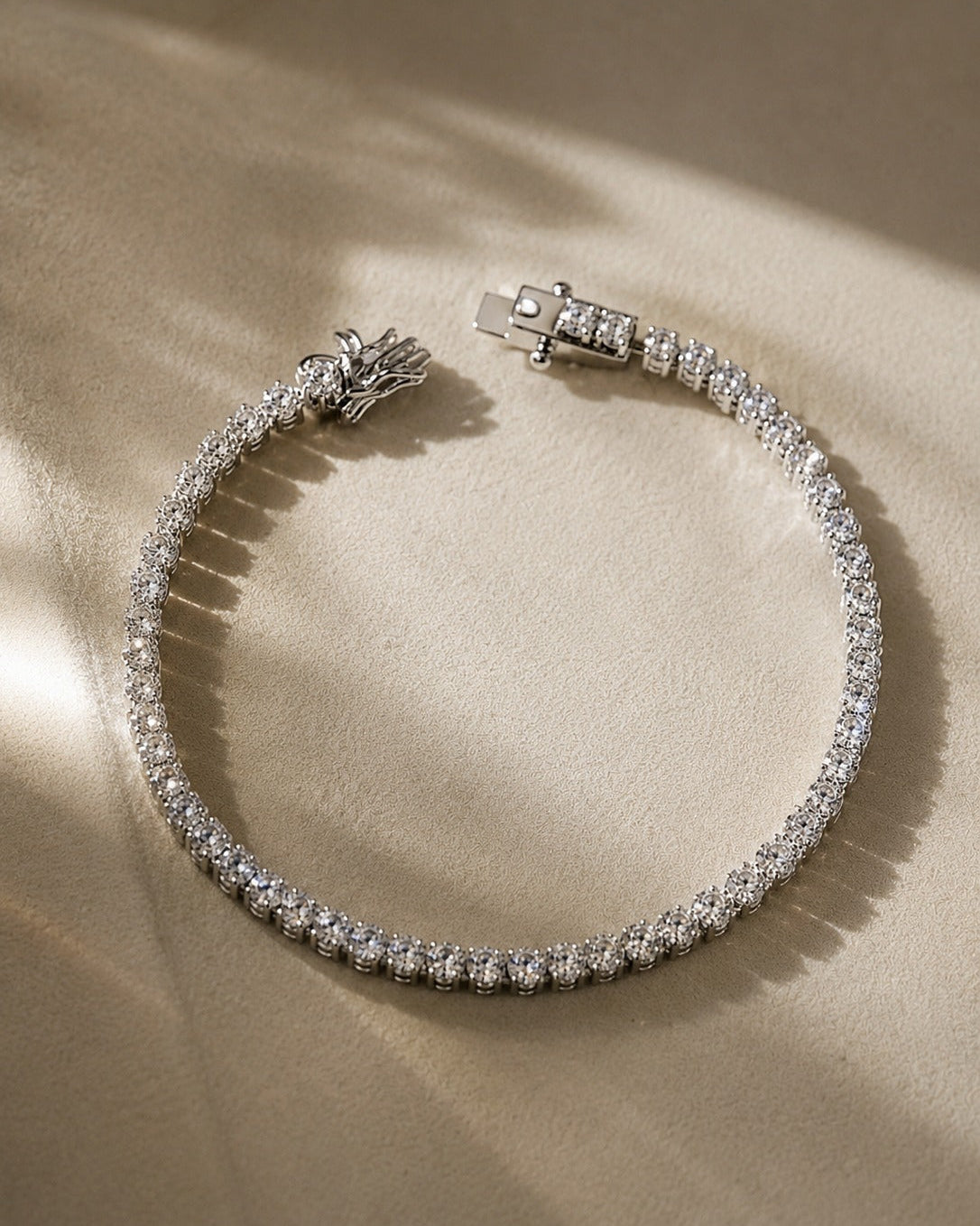 925 Sterling Silver round-cut tennis bracelet with secure box clasp