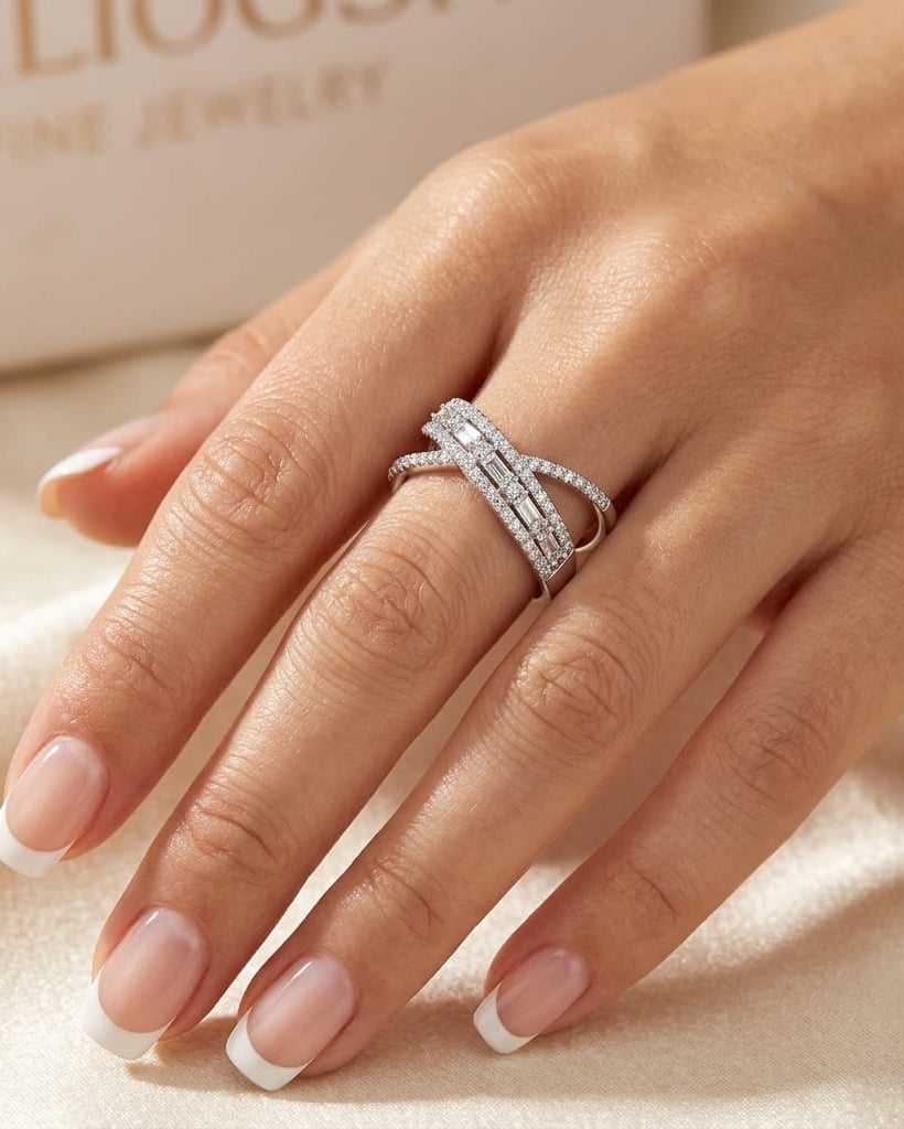 925 Sterling Silver crisscross ring with baguette and pavé white accents
