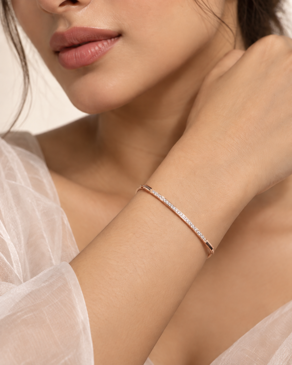 Rose gold bar bracelet with sparkling white accents