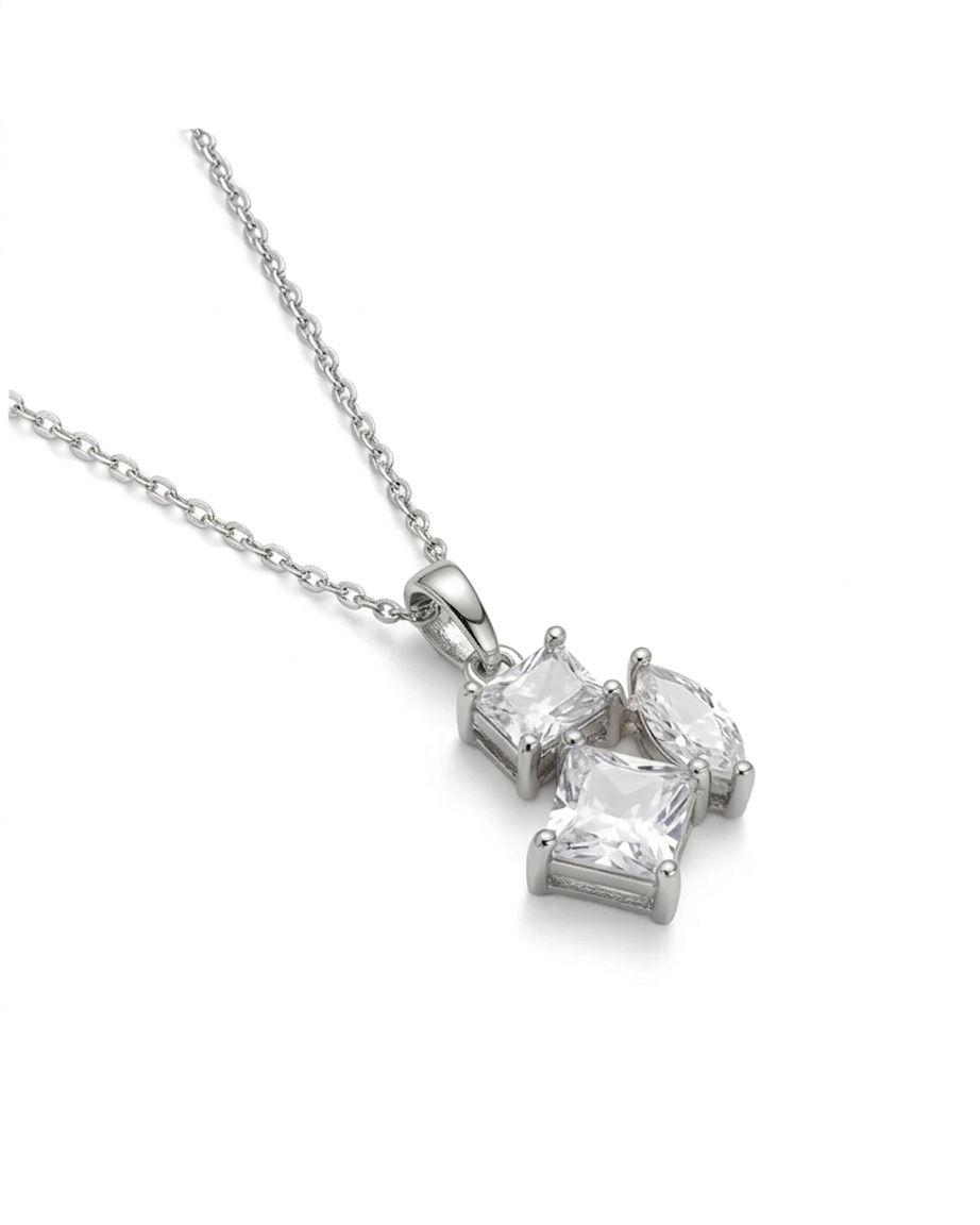 Diamond necklace with three square-cut diamonds on a white background #color_silver