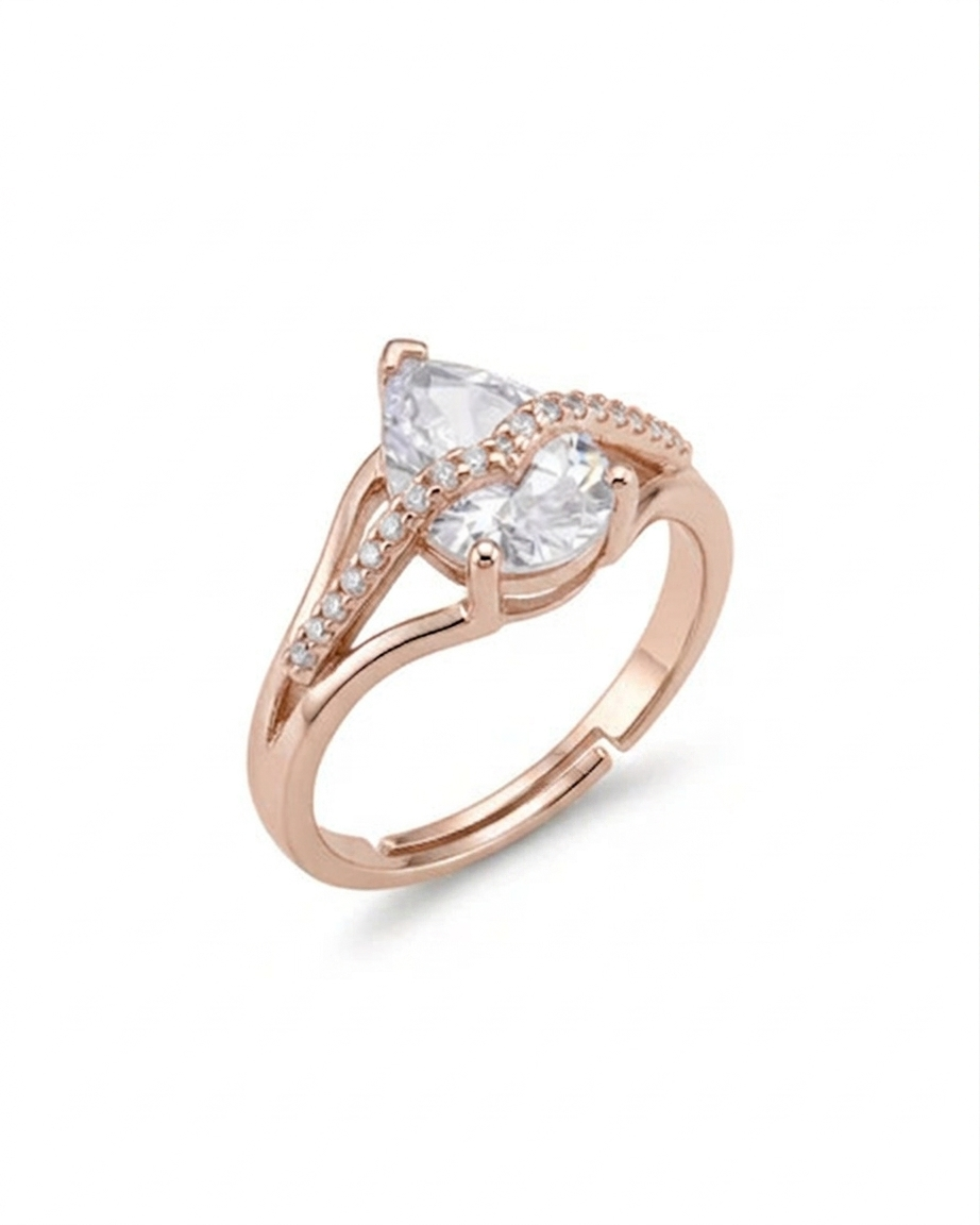 Rose gold ring with a clear gemstone on a white background  #color_rose gold