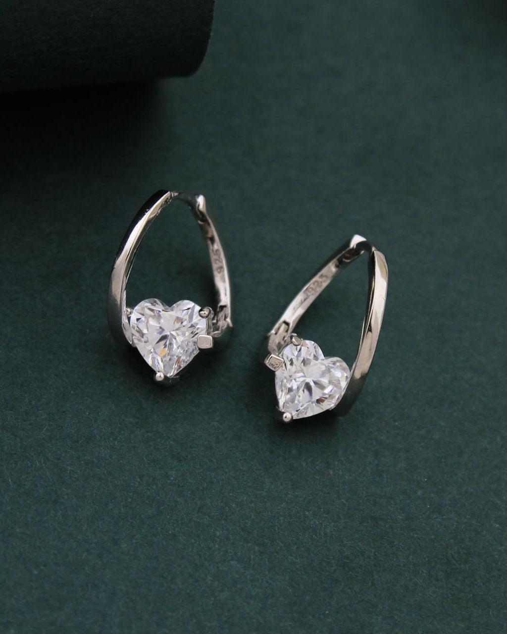 Pair of 925 Sterling Silver heart charm huggie hoop earrings.