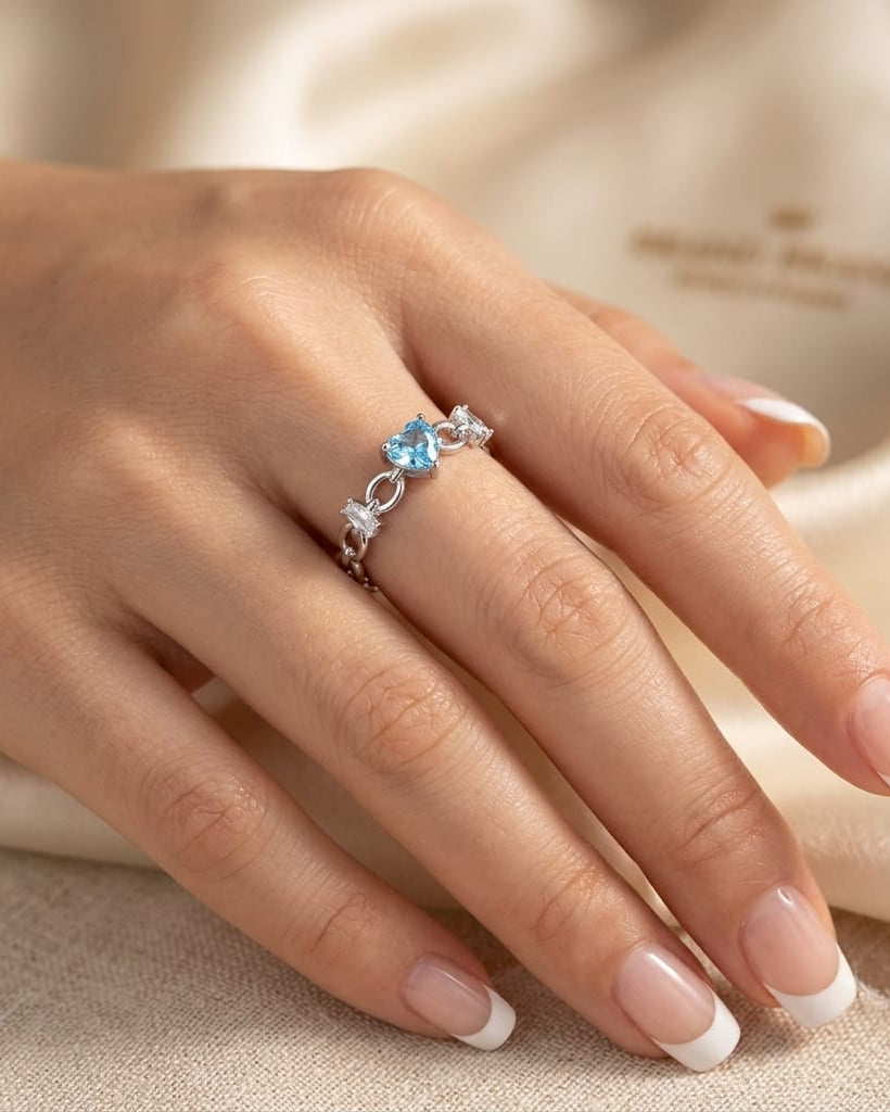 925 Sterling Silver heart link open ring with blue and white accents.