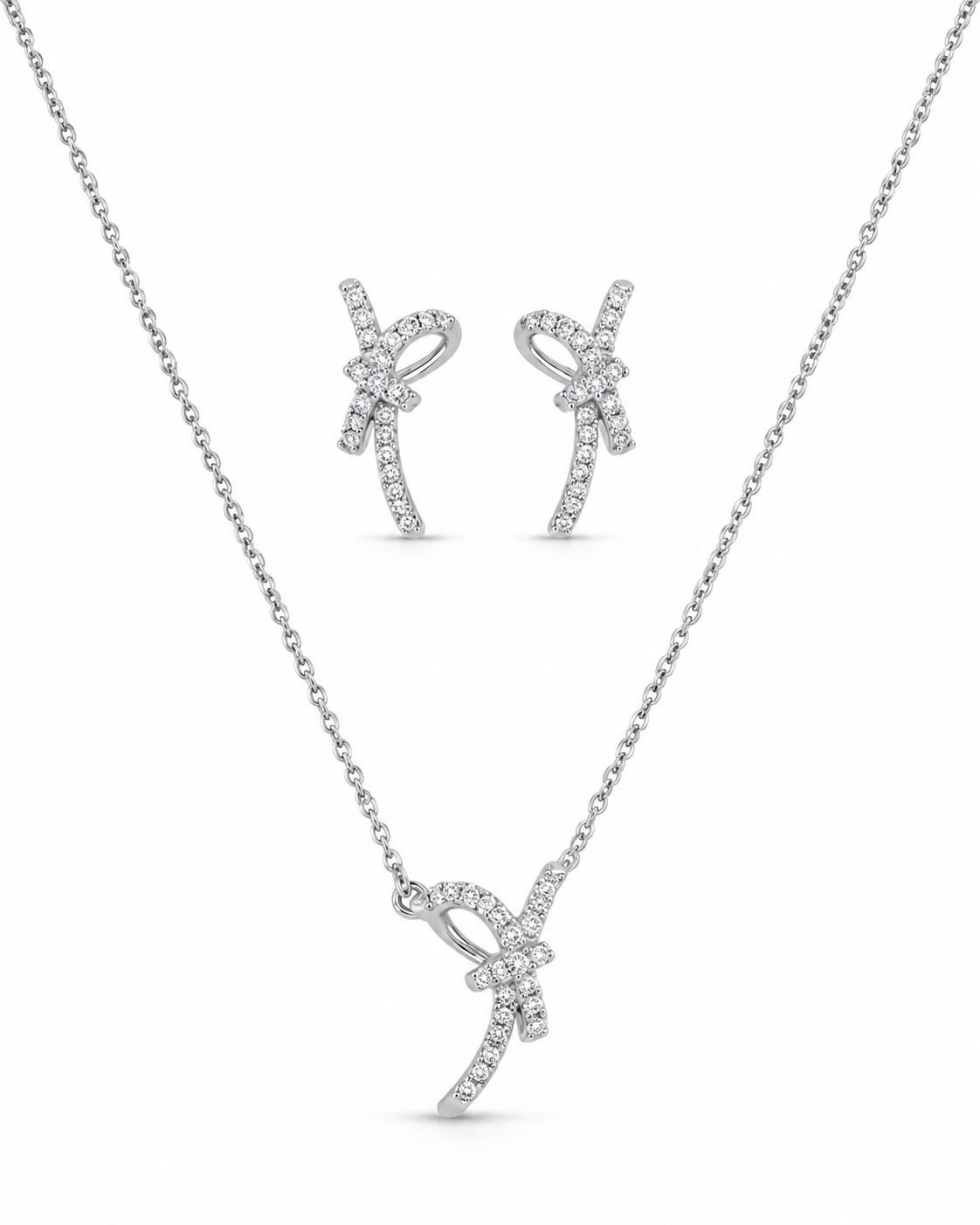 Pave knot necklace and matching earrings with sparkling white accents