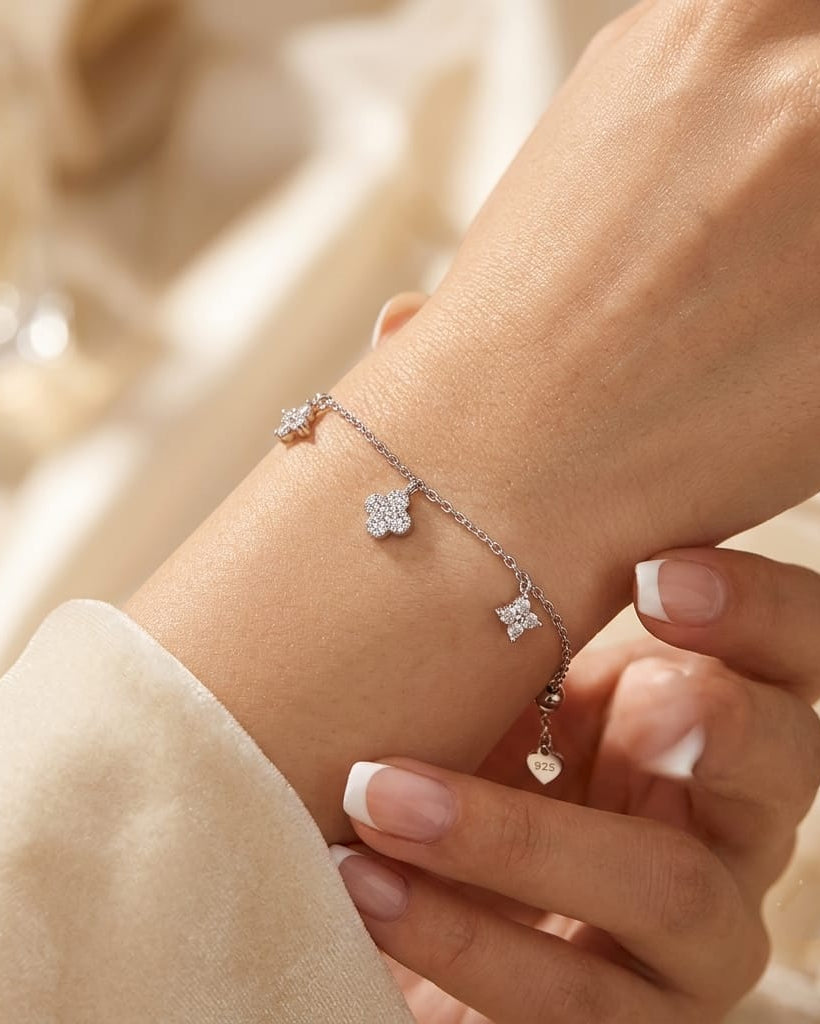 925 Sterling Silver pavé clover charm bracelet with fine cable chain.