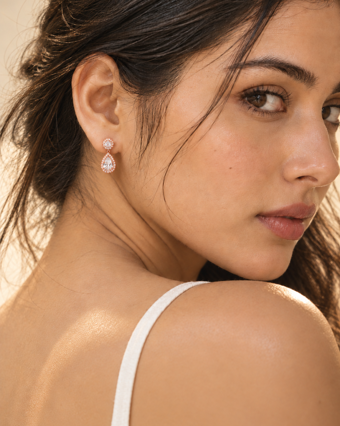 925 Sterling Silver pear halo drop earrings with signature finish #color_rose gold 
