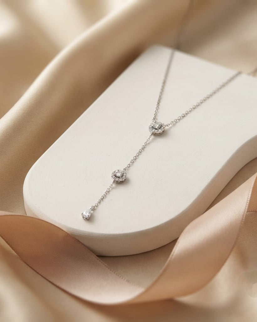 925 Sterling Silver square halo lariat necklace with round and pear drop accents