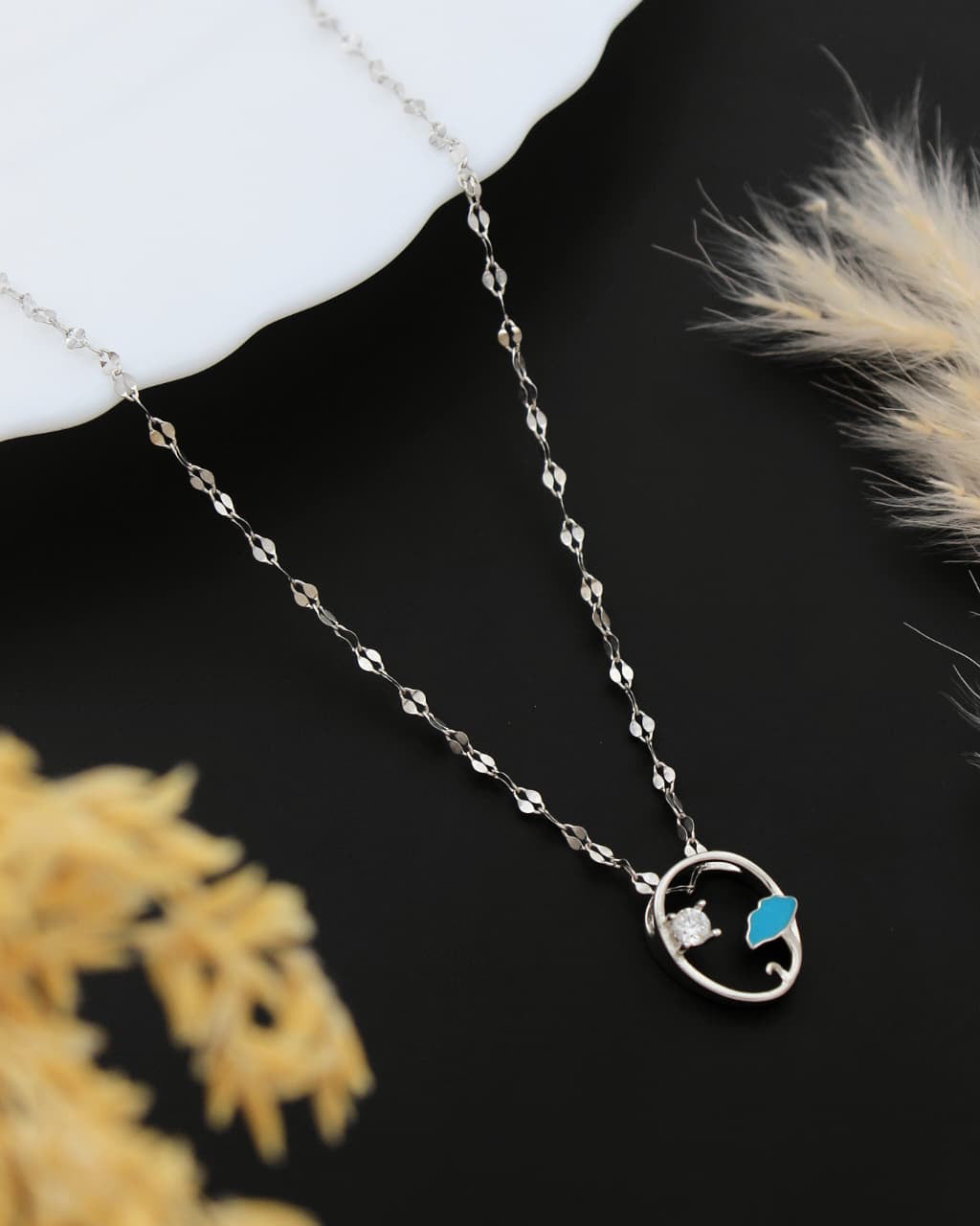 Silver planet necklace