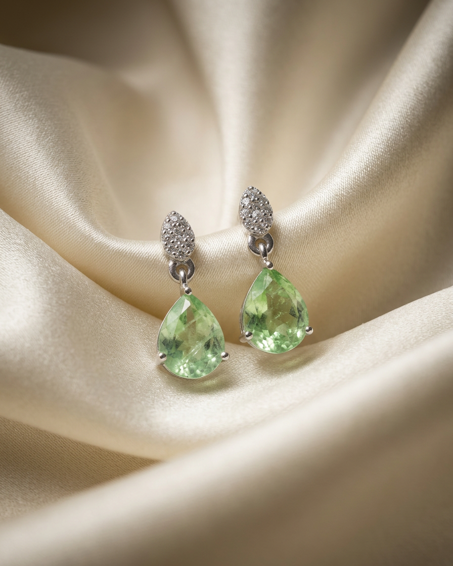 green pear-cut drop earrings with white pavé top #color_silver