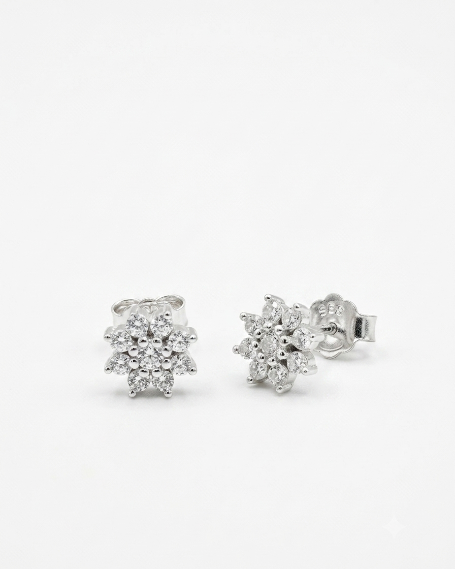 snowflake cluster stud earrings with brilliant white accents #color_silver